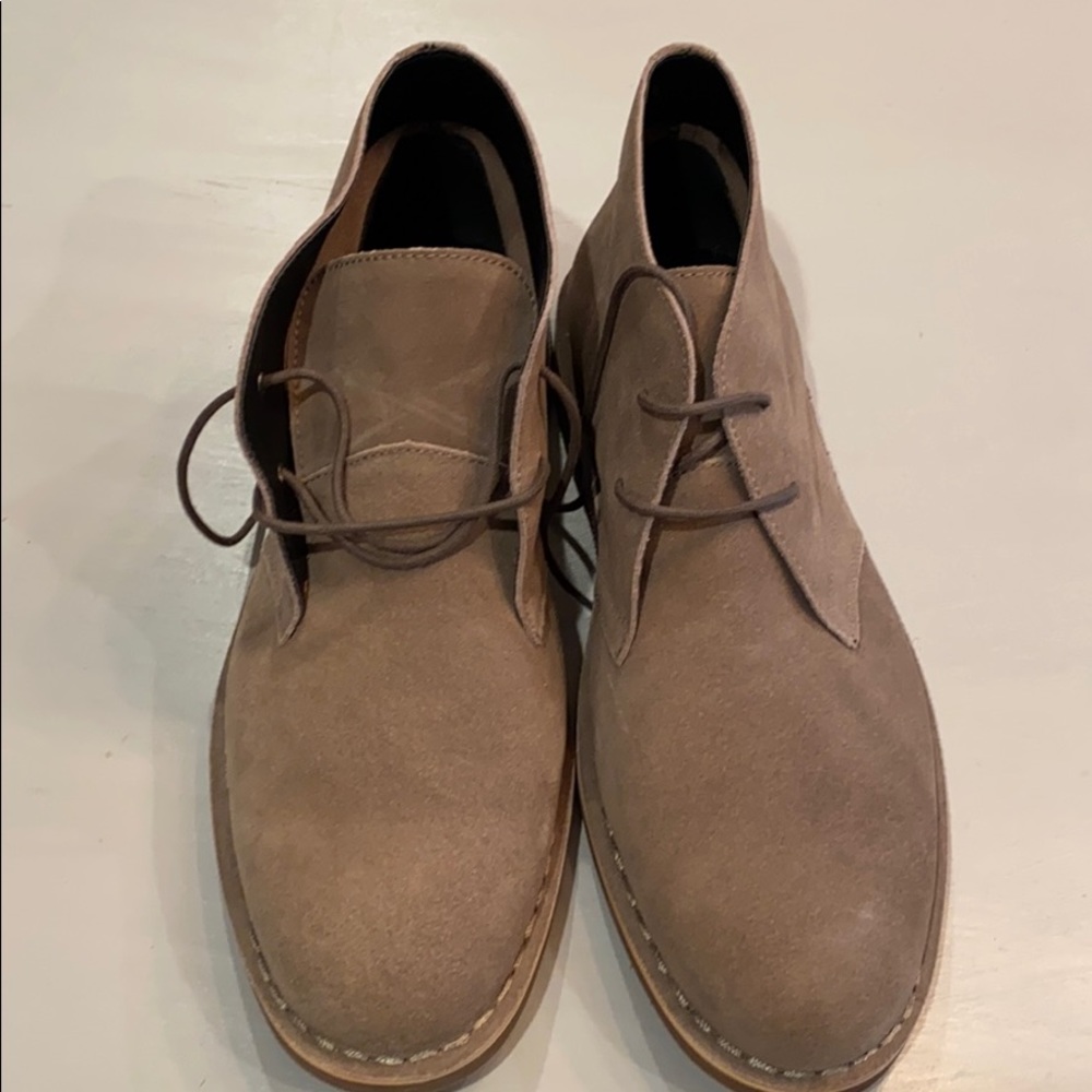 Tan suede leather shoes. Never been worn.